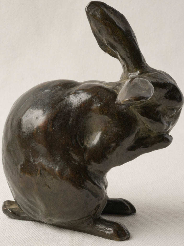 Intimate antique bronze rabbit piece