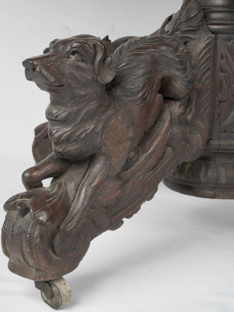 Ornate animal-inspired French oak table