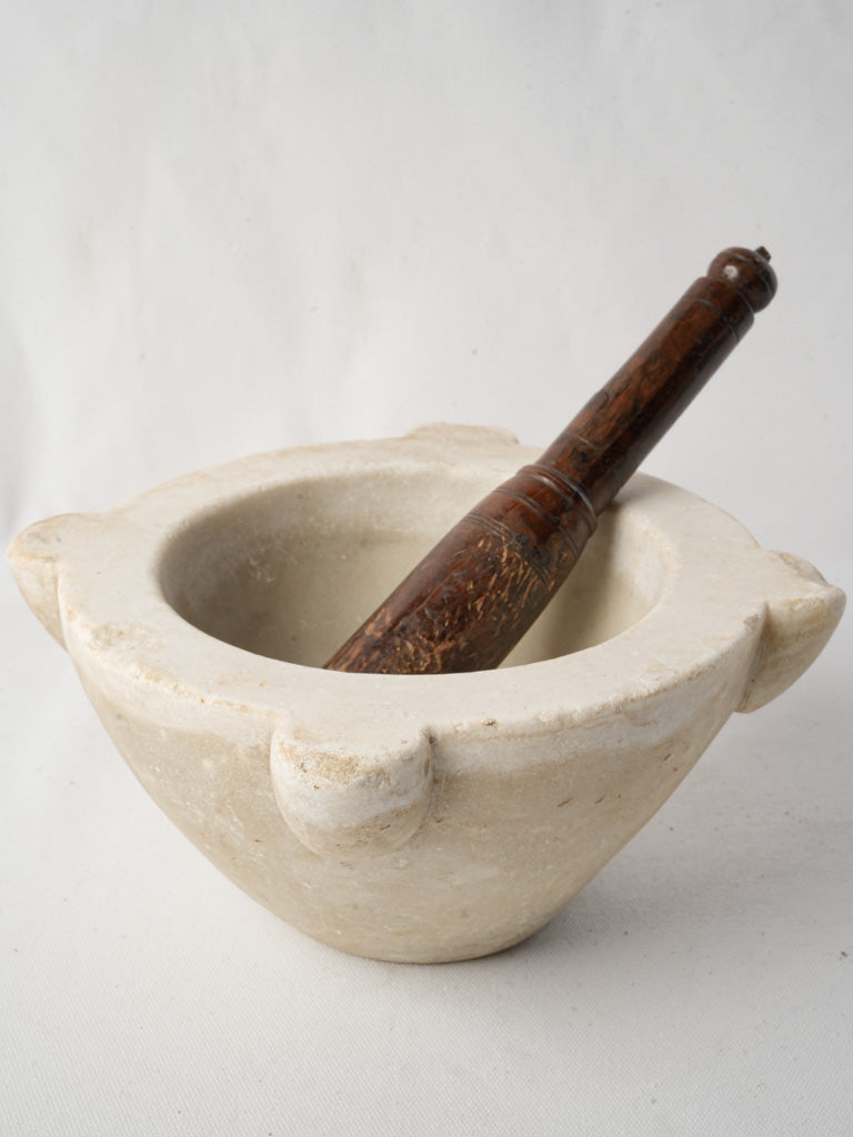 Classic quadrilobed marble mortar