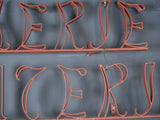 Traditional red Boucherie shop sign