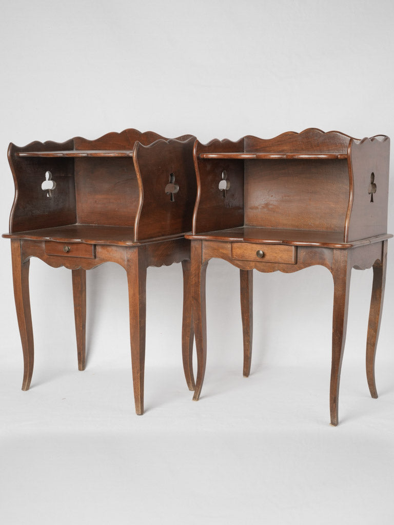 Antique French walnut nightstands with clover cutouts