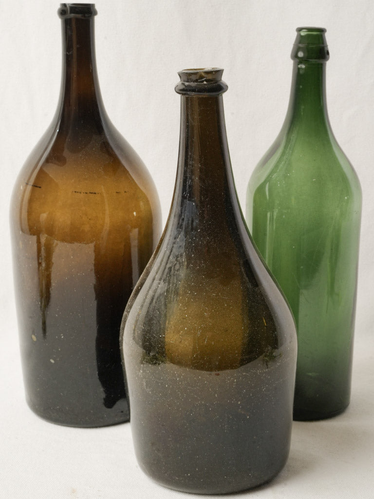 Set of 3 Antique French Hand Blown Wine Bottles in Green and Amber Glass - 15¾"