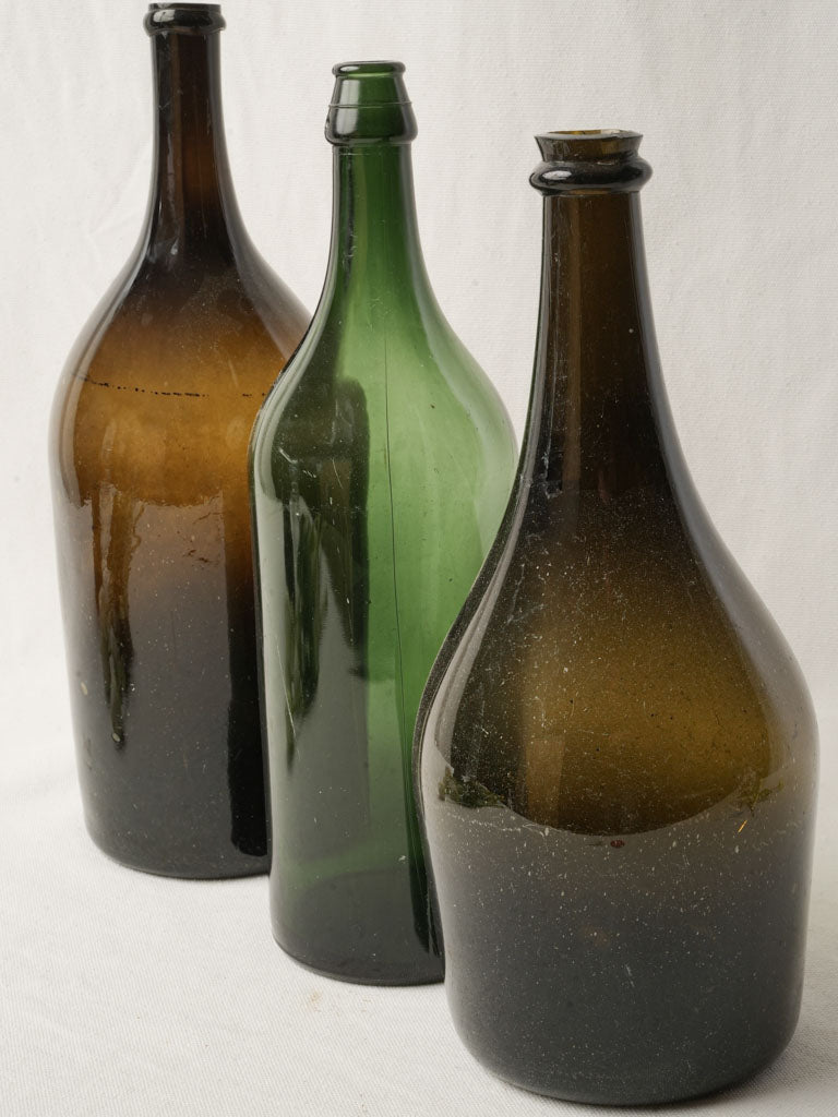 Set of 3 Antique French Hand Blown Wine Bottles in Green and Amber Glass - 15¾"