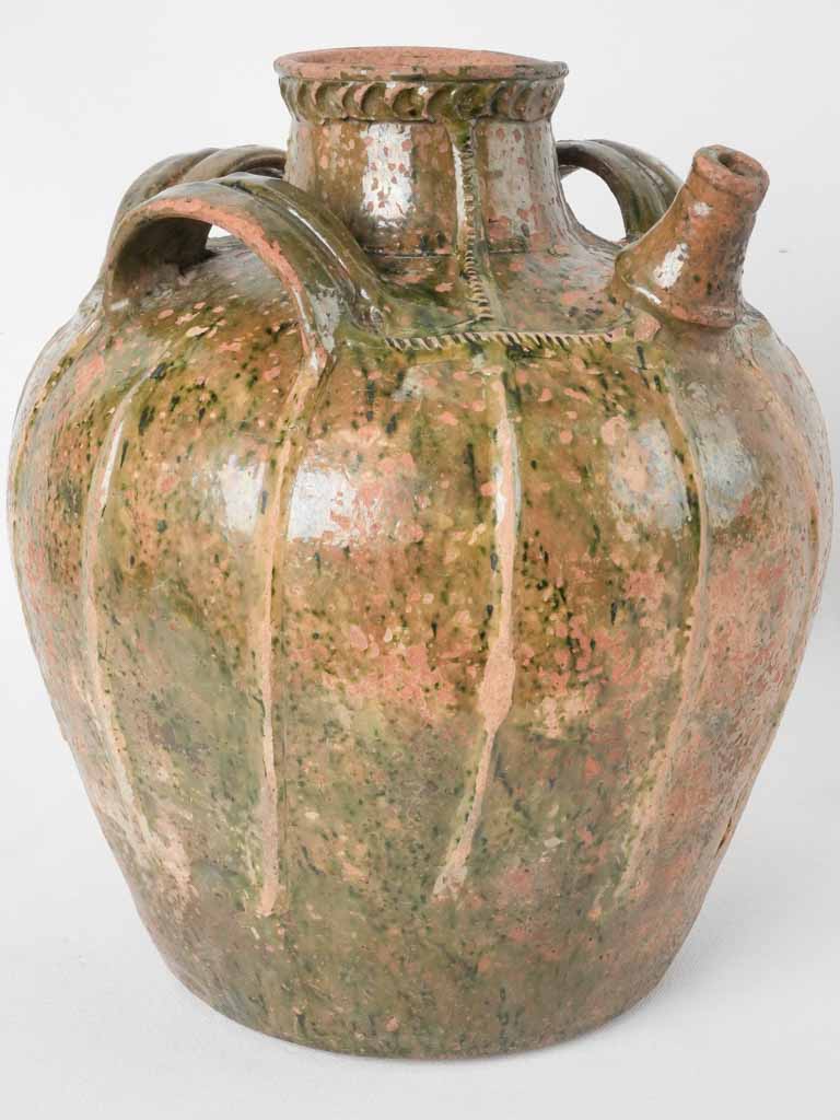 Antique French walnut oil jar