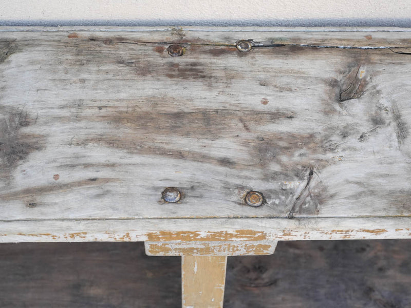 Traditional, weathered guinguette picnic benches