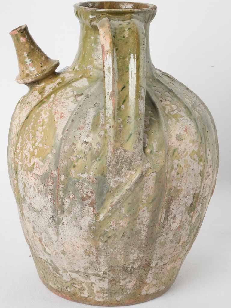 Large 19th century French walnut oil jar from the Ardeche - pale green 15¼"