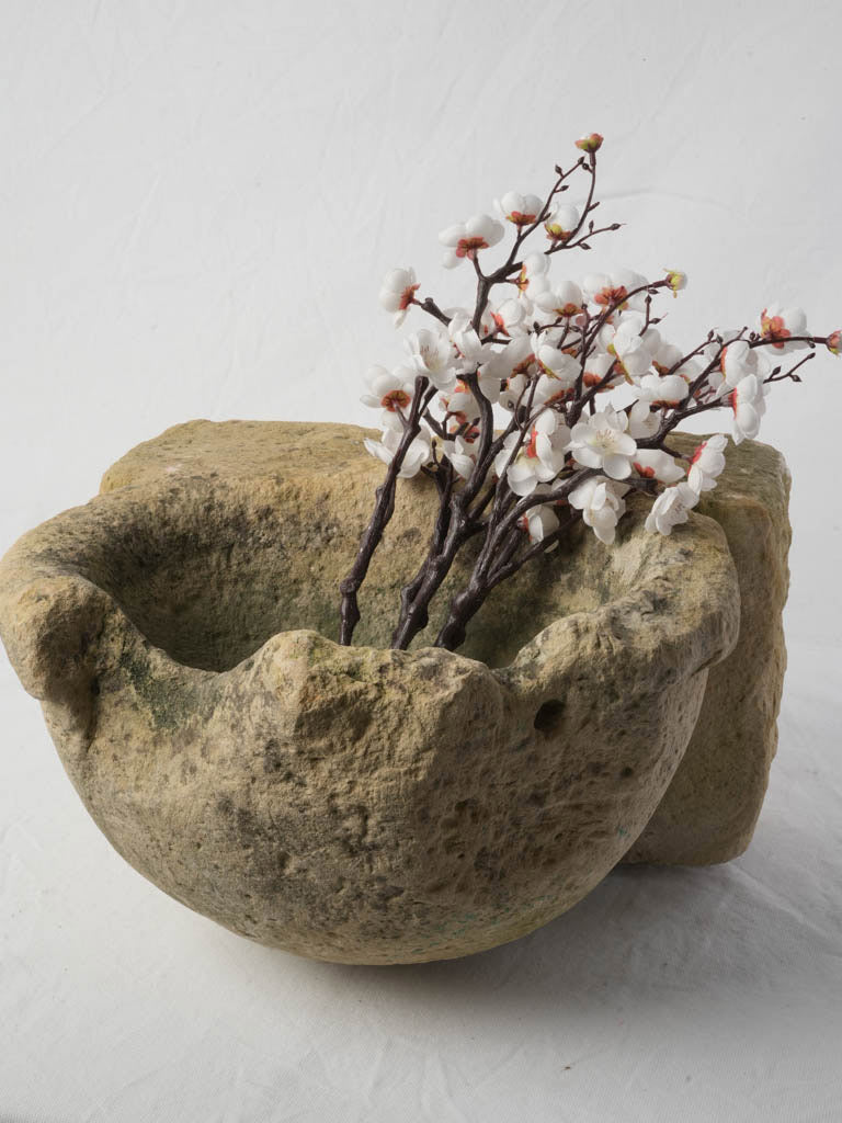 Antique mossy green stone stoup