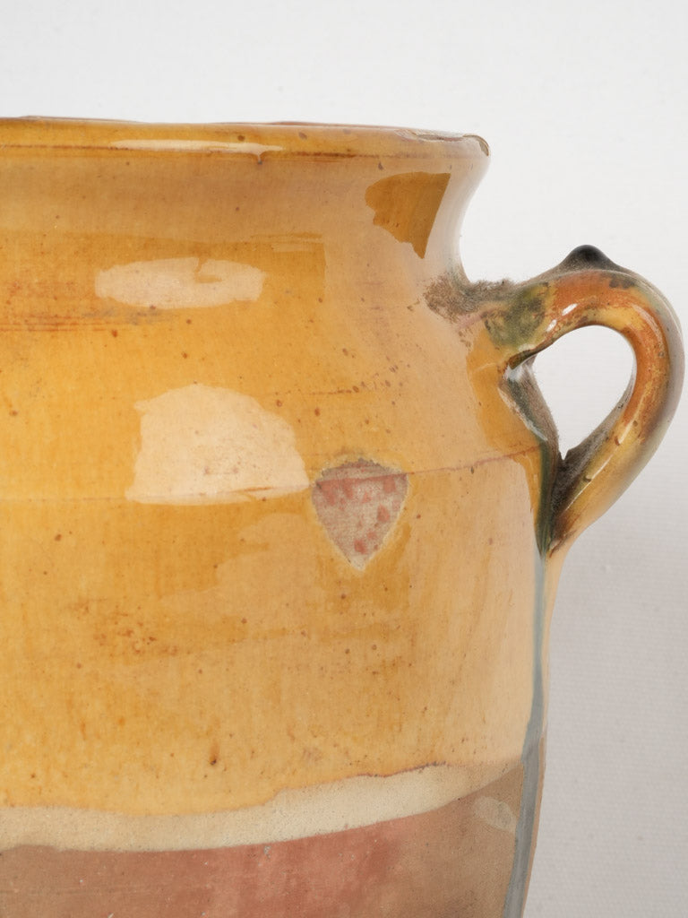 Classic rustic ocher glazed confit pot