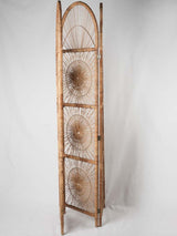 Retro-style natural rattan concertina screen