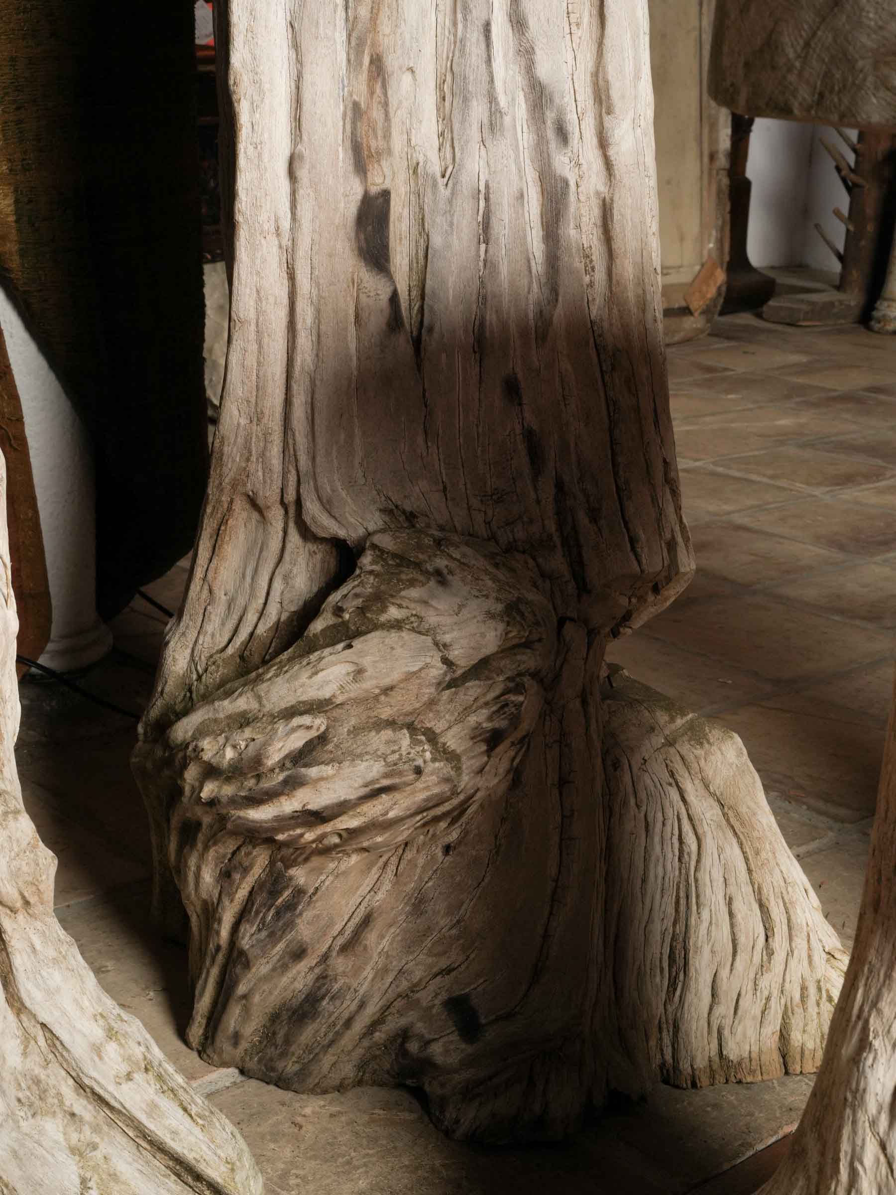 Naturalistic Driftwood Table and Three-Stool Ensemble, 20th Century.