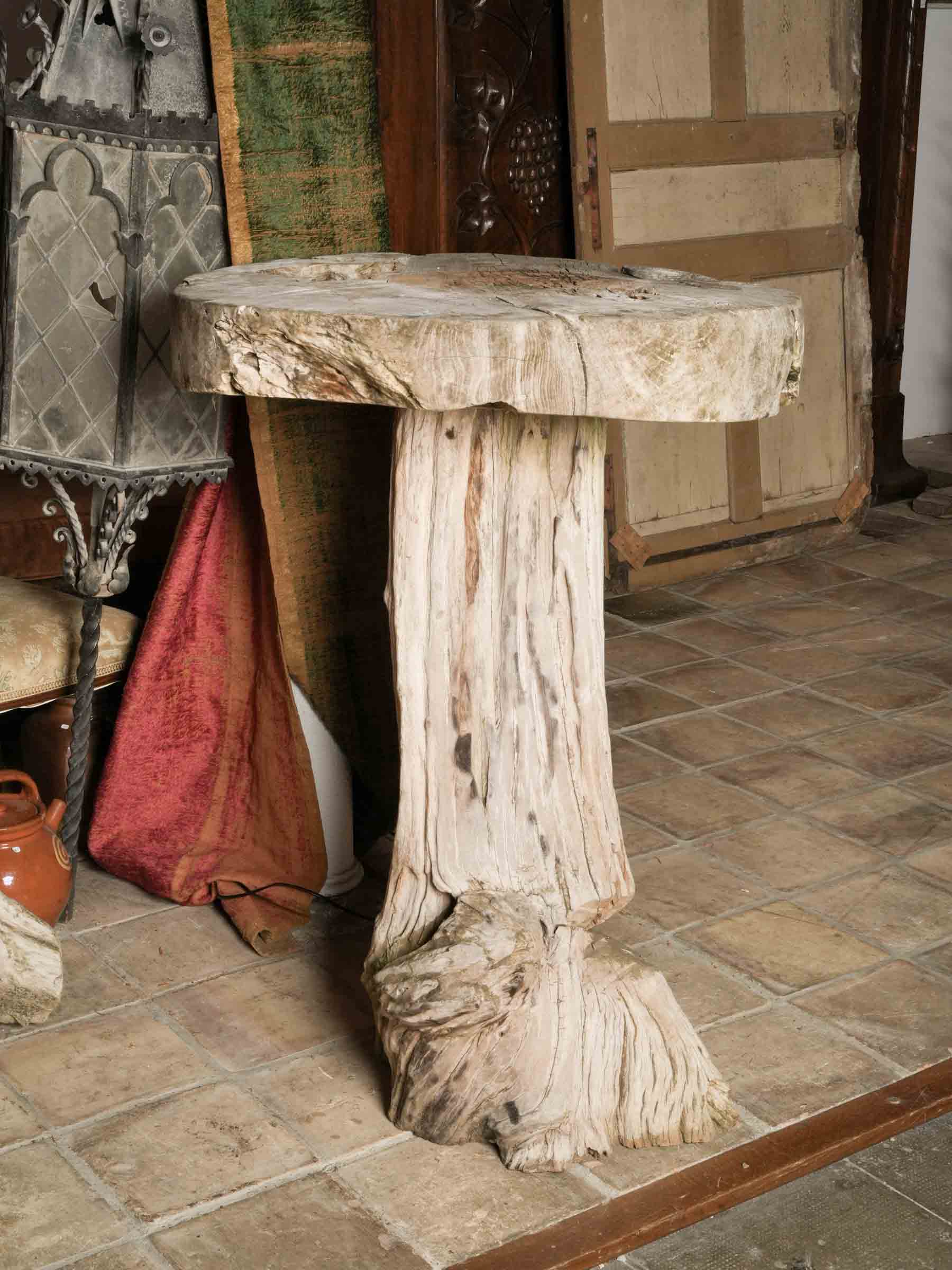 Naturalistic Driftwood Table and Three-Stool Ensemble, 20th Century.
