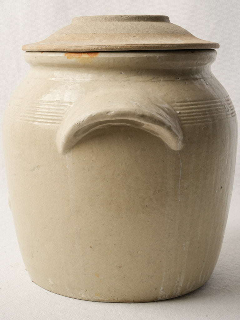 Pale-colored salt storage pot  