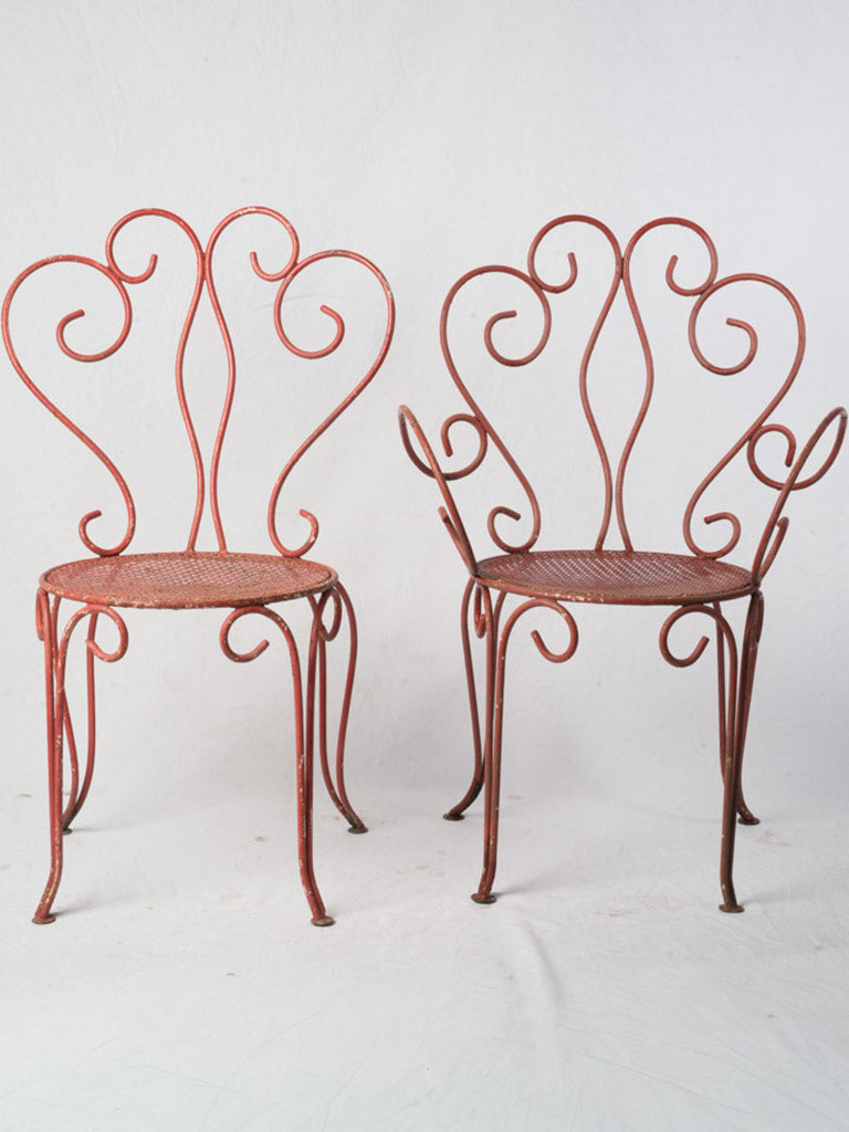Antiqued iron patio chairs  