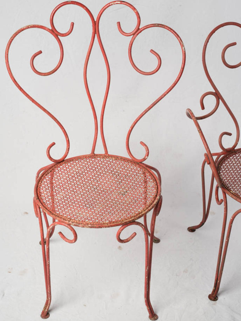 Mid-century wrought iron armchairs  
