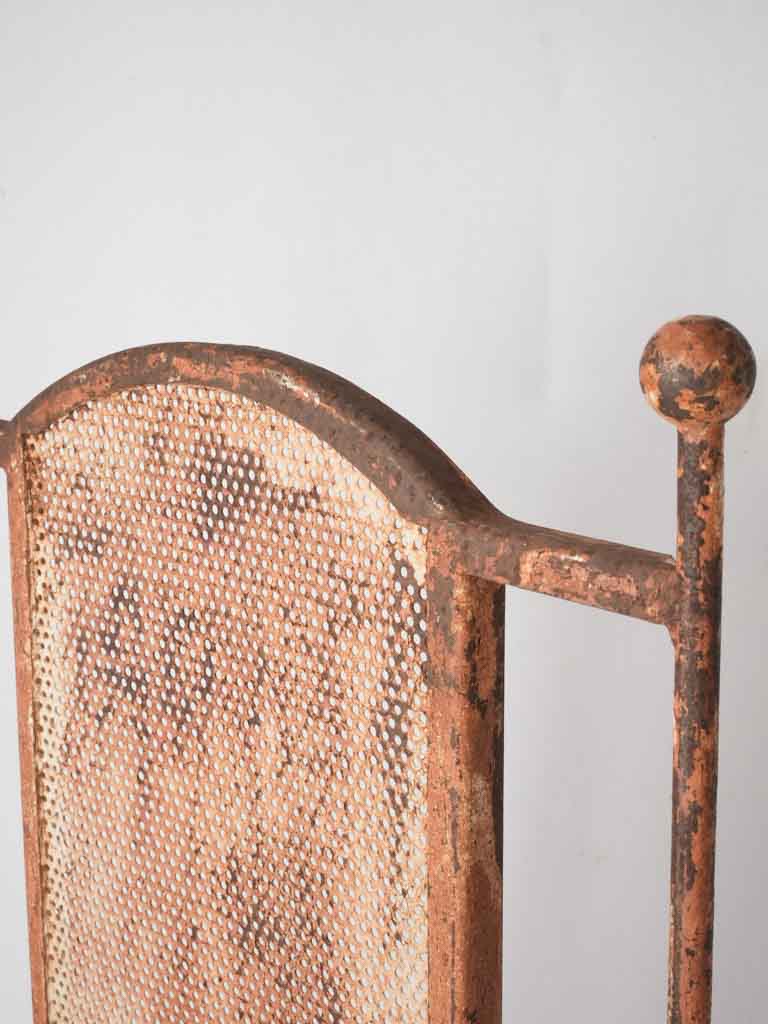 Pair of wrought iron garden armchairs