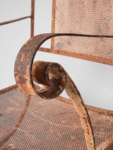 Pair of wrought iron garden armchairs