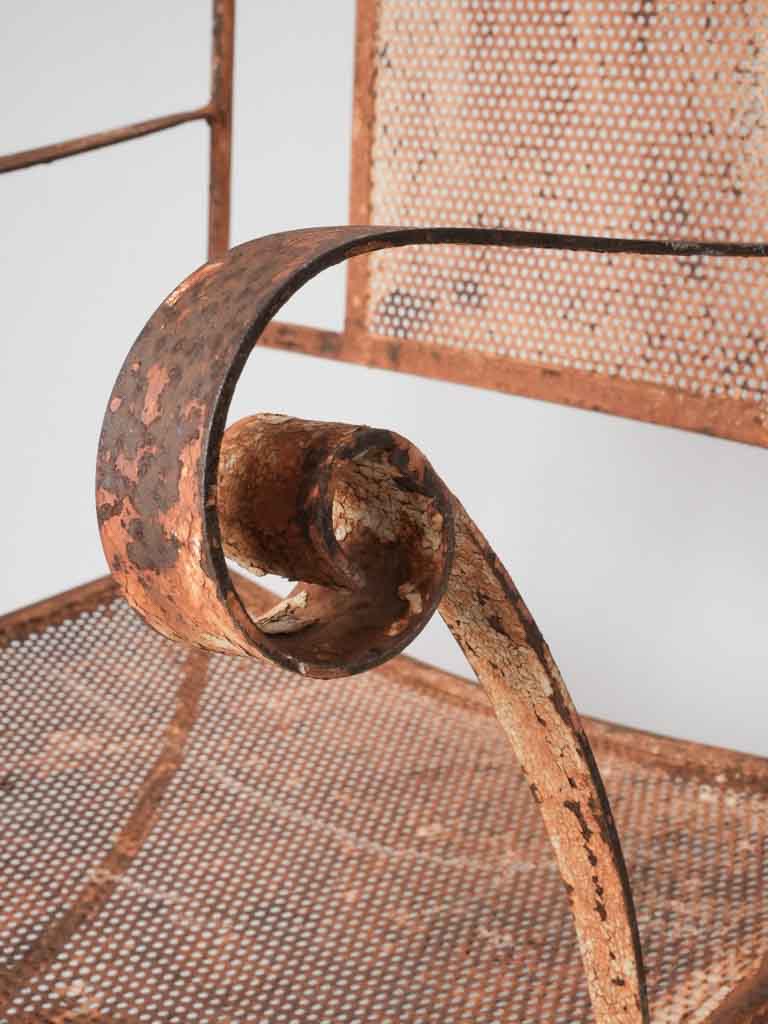 Pair of wrought iron garden armchairs