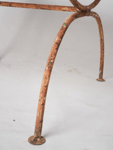Pair of wrought iron garden armchairs