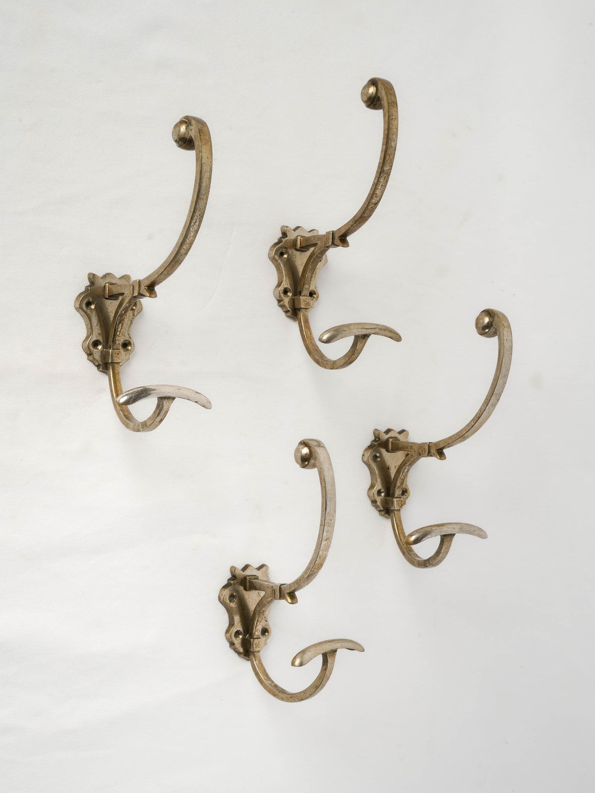 Set of Four Vintage Metal Wall Hooks w/ Scrolling Arms - 7½"