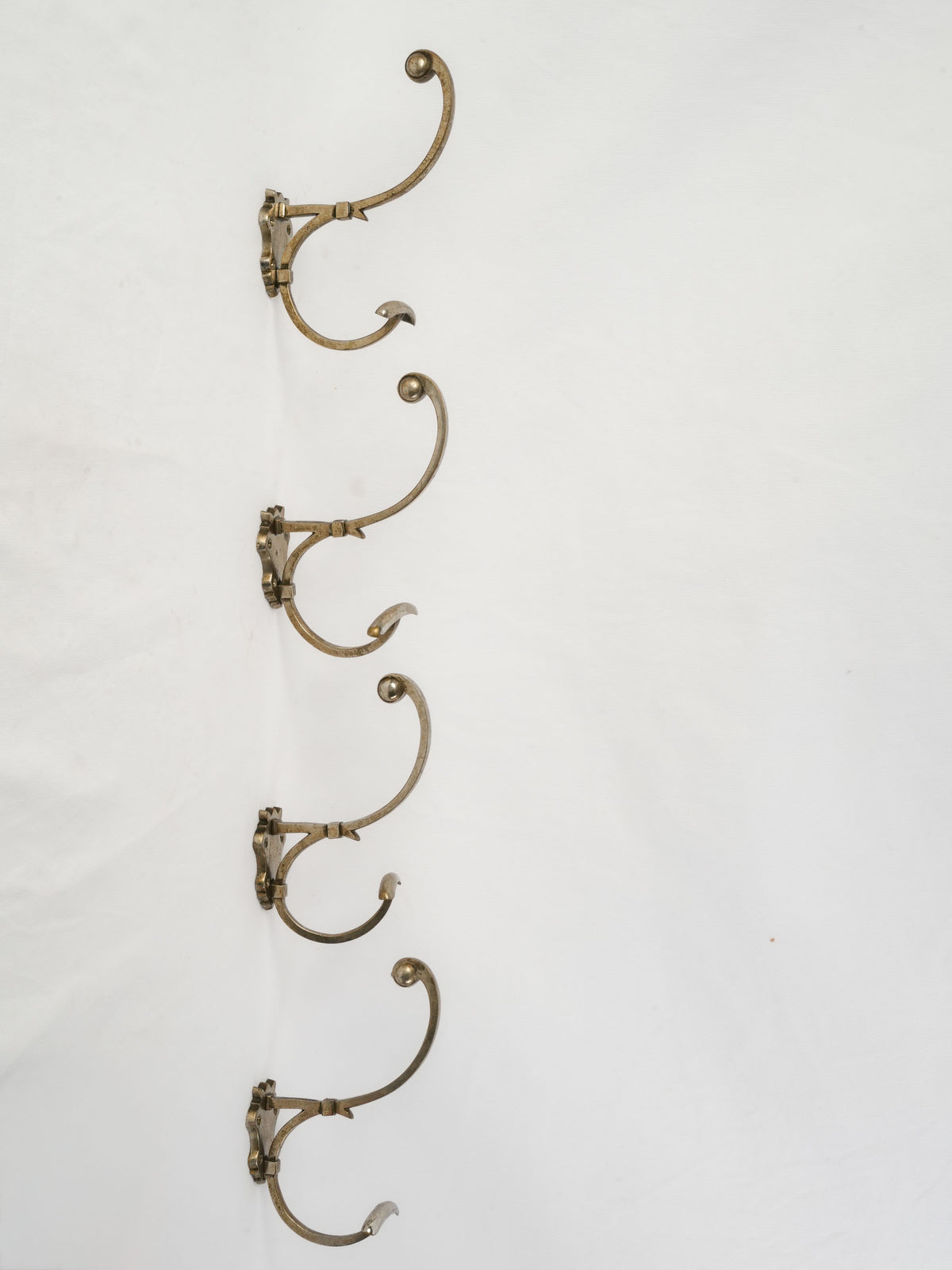 Set of Four Vintage Metal Wall Hooks w/ Scrolling Arms - 7½"