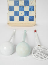 Playful 1960s enamel ladle set