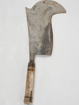 Time-worn artisanal wooden handle cleaver