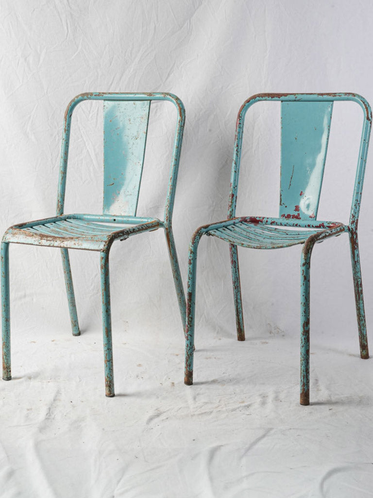 Rustic weathered Tolix dining chairs