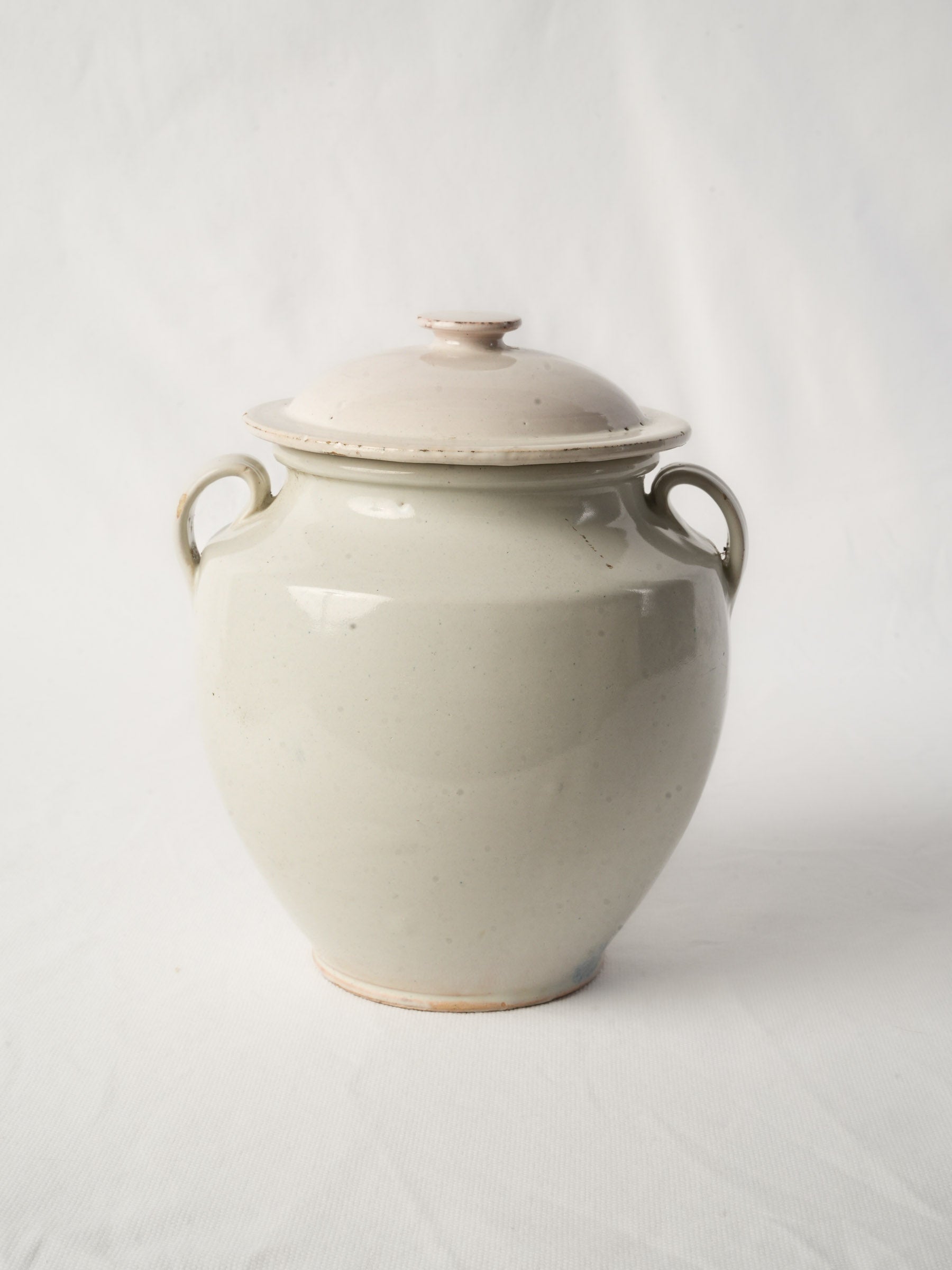 Antique white-glazed confit pot