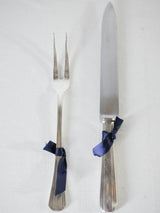 Elegant 1950s silver flatware, stainless blade