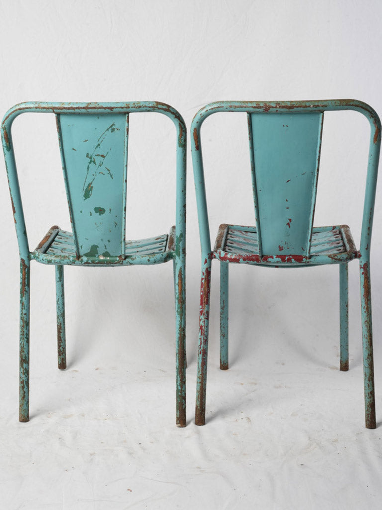 Vibrant Mediterranean sky blue chairs