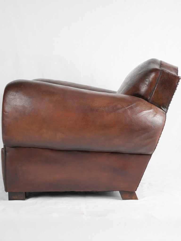 Large 1930s Havana moustache back leather club chair