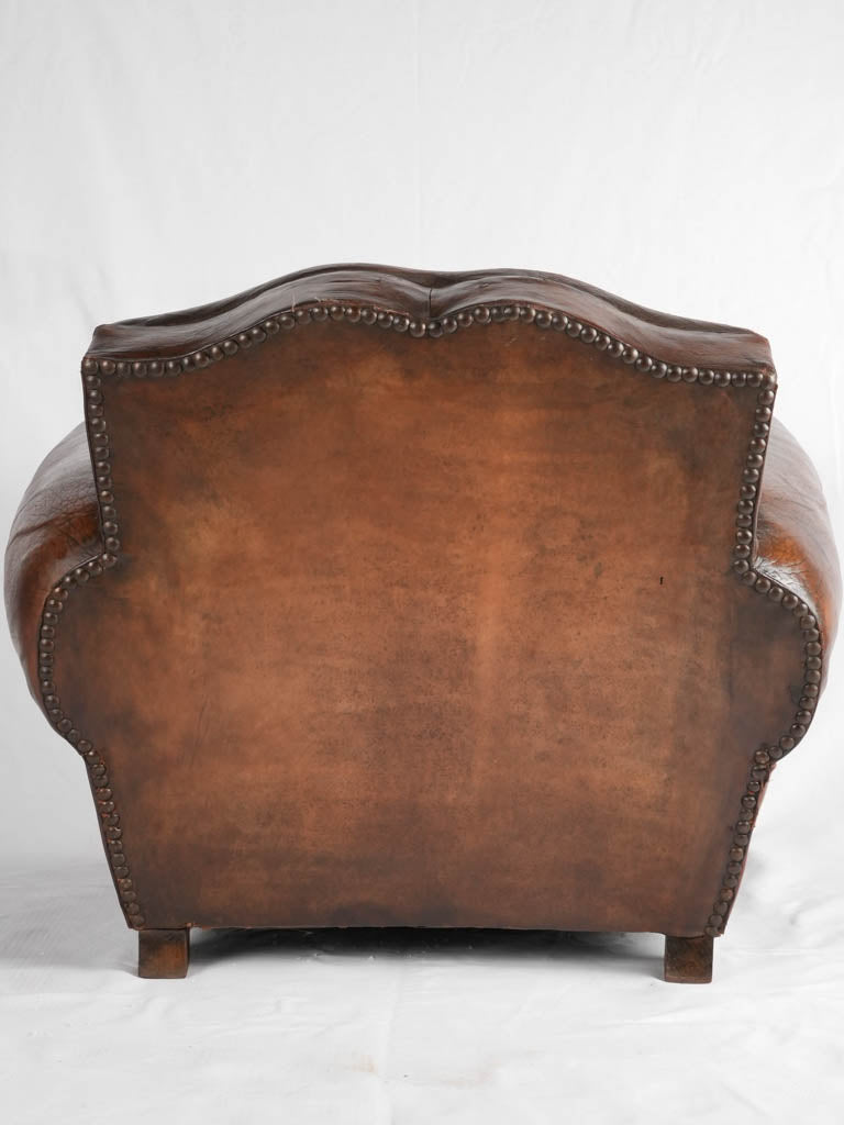 Large 1930s Havana moustache back leather club chair
