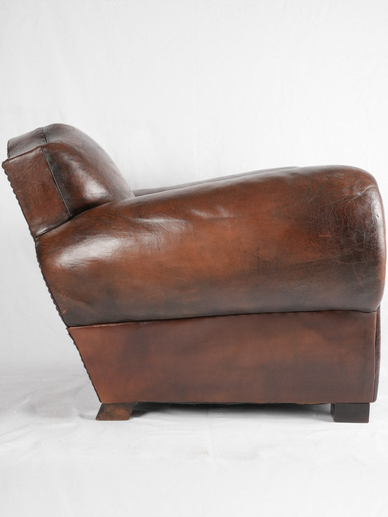 Large 1930s Havana moustache back leather club chair