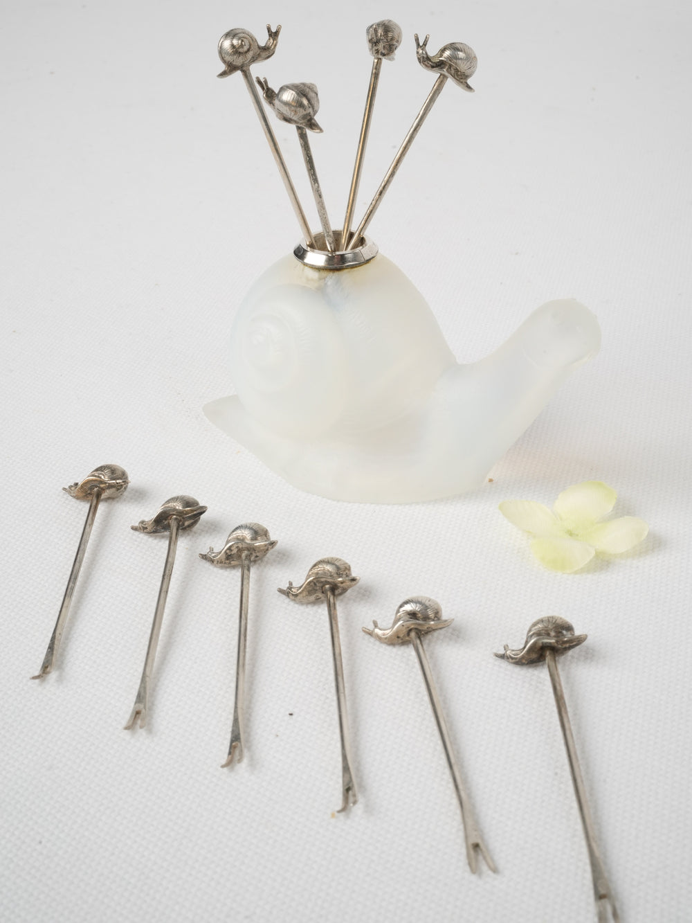 8 Escargot picks in translucent glass snail holder - 4¼