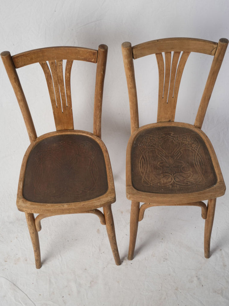 Graceful floral motif bistro chairs  