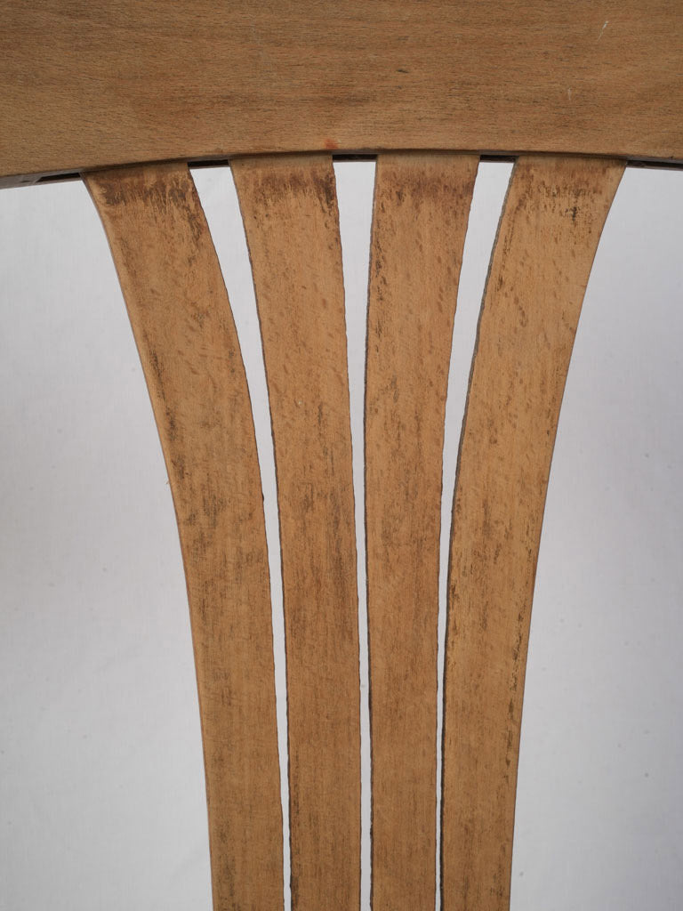 Rustic gently curved back chairs  