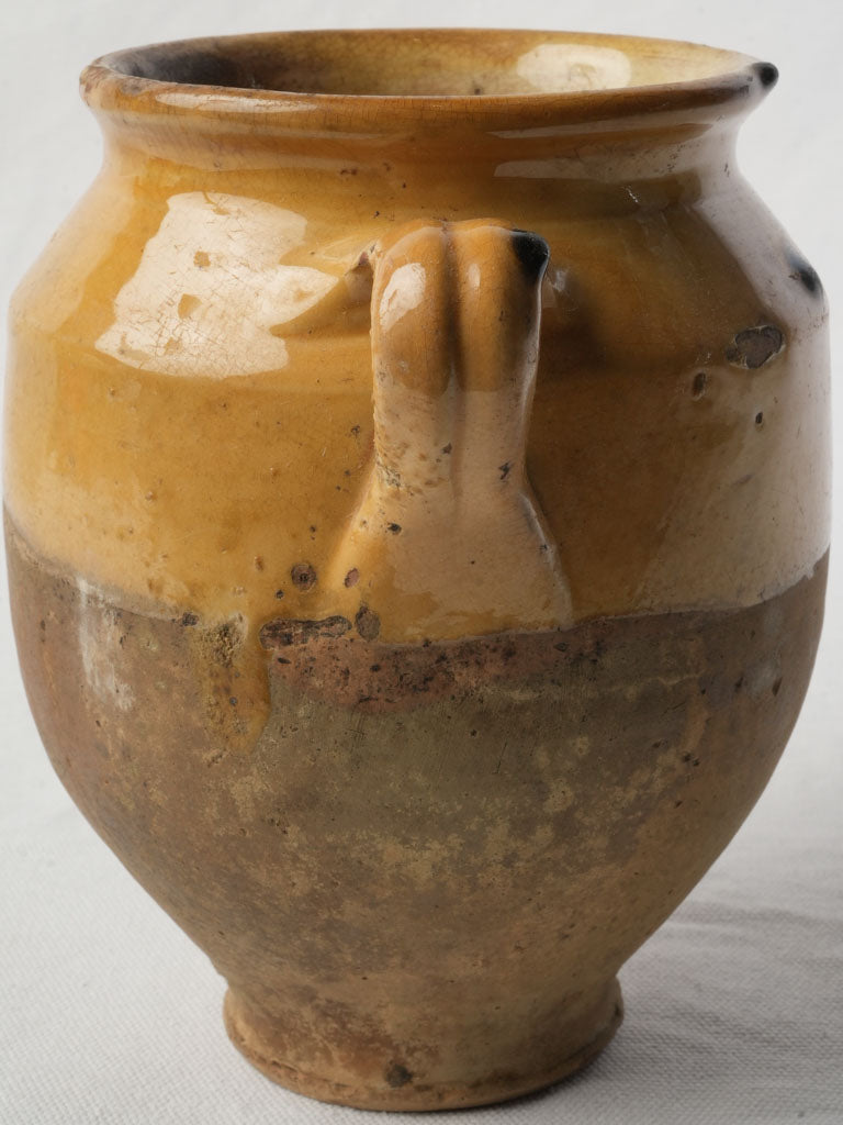 Weathered ochre finish ovoid vessel  