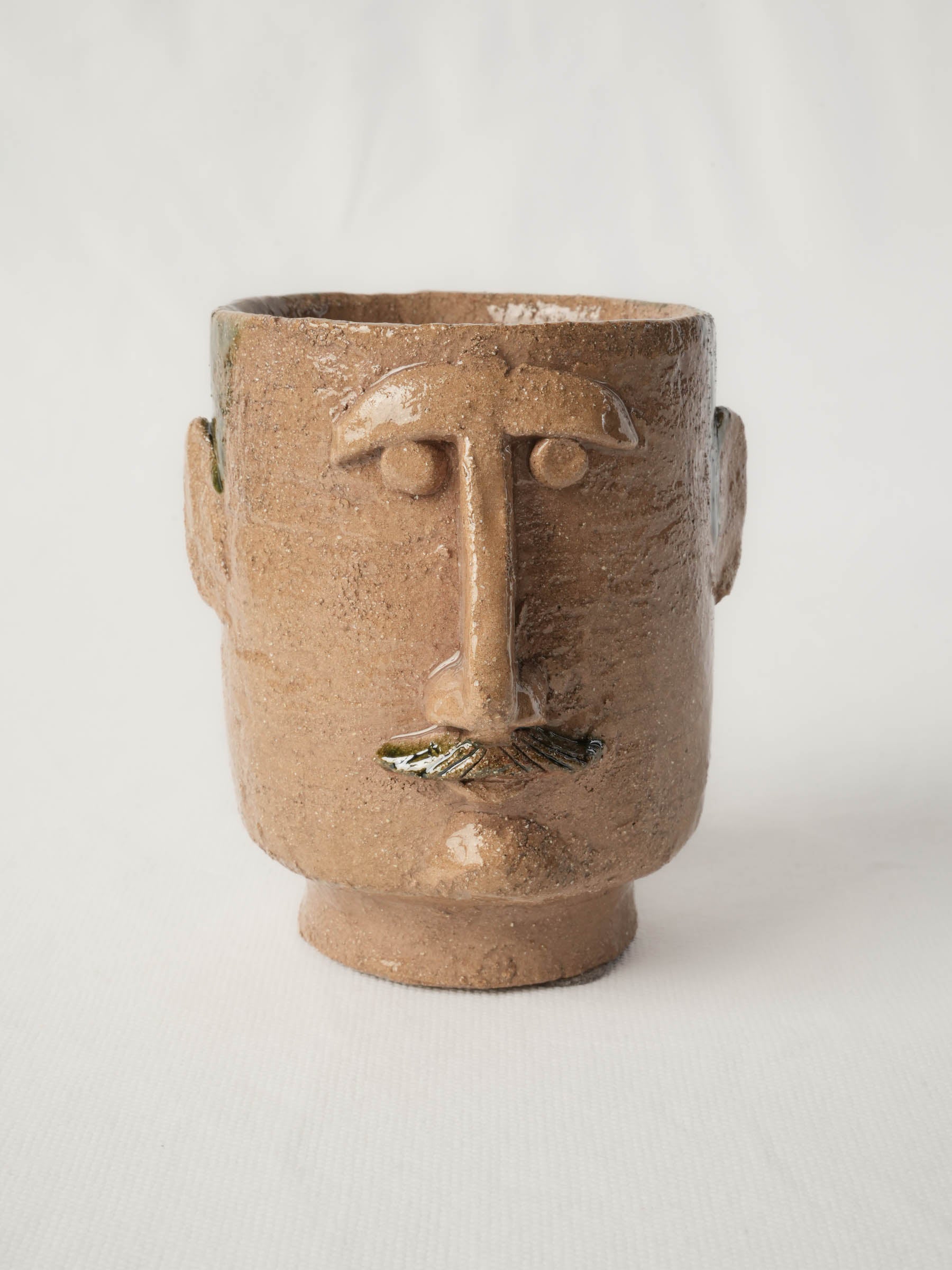 Handcrafted textured stoneware vessels  