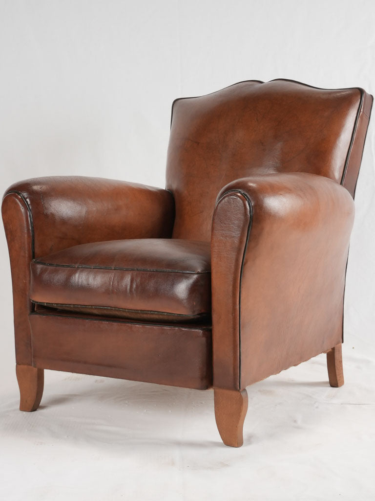 Reserved LM Petite French leather club chair w/ moustache back - 1930s