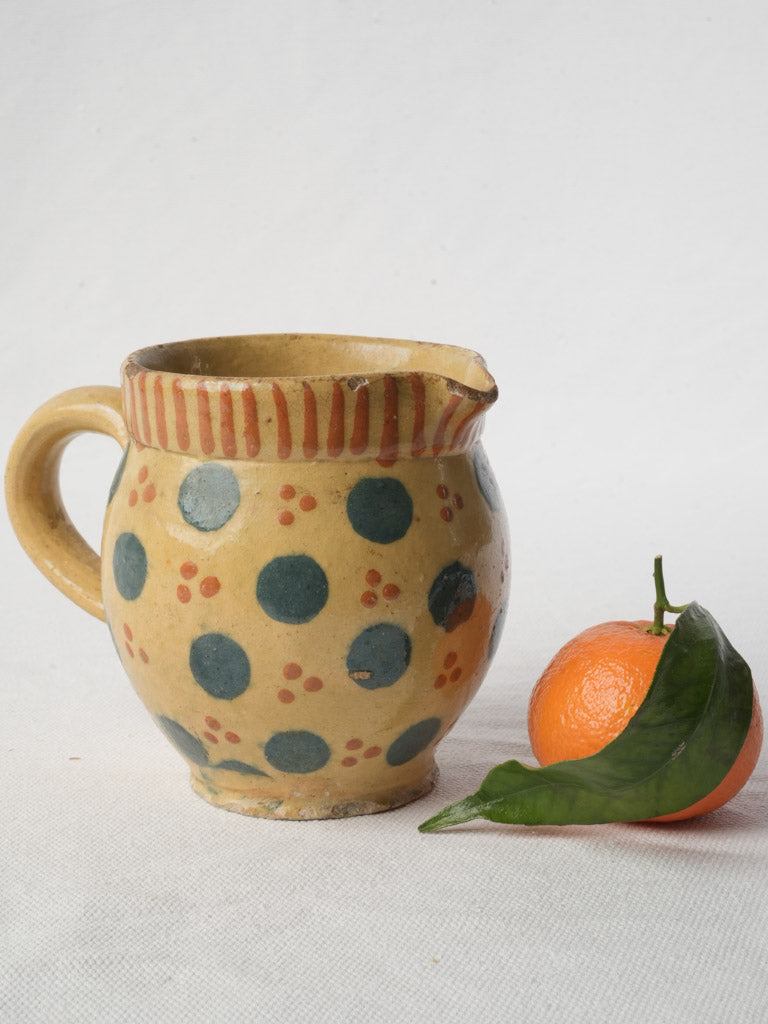 Vintage earthenware milk pitcher