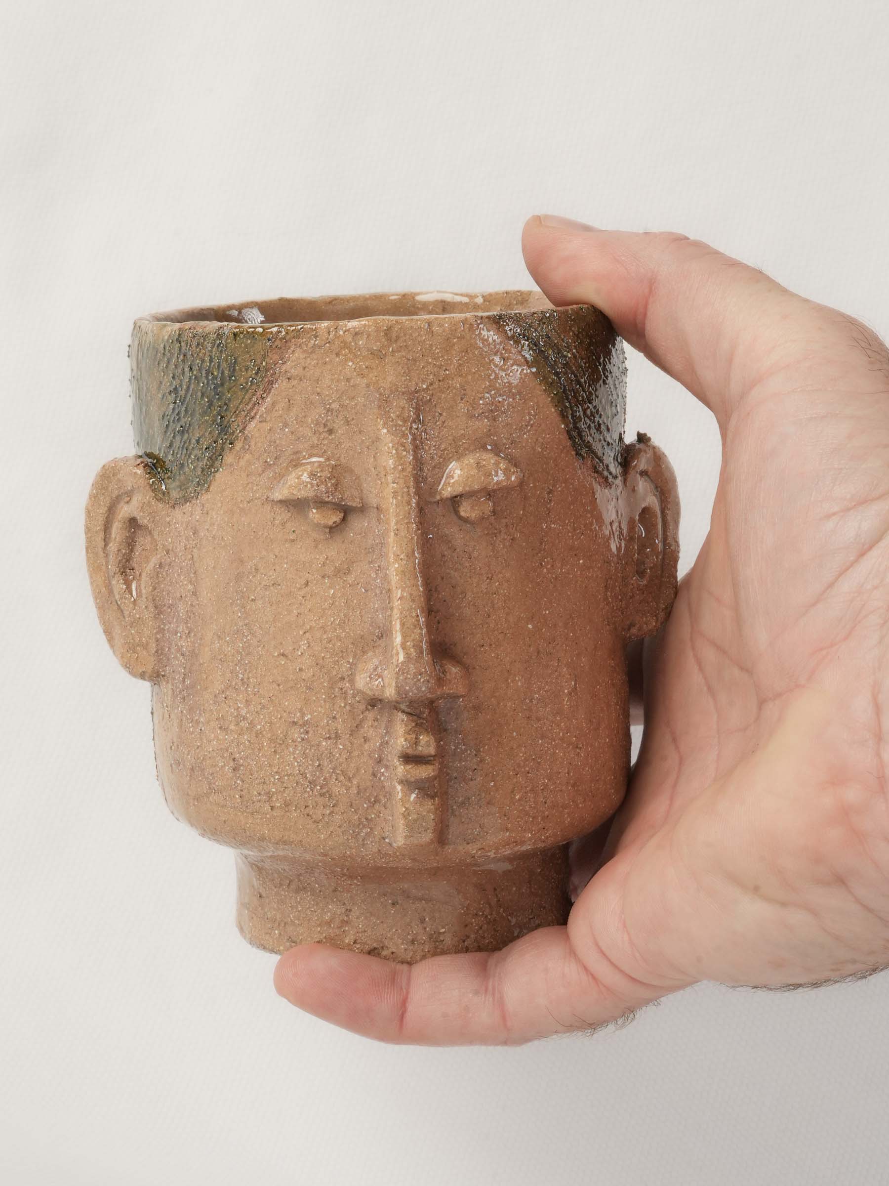 Artistic figural ceramic cups  