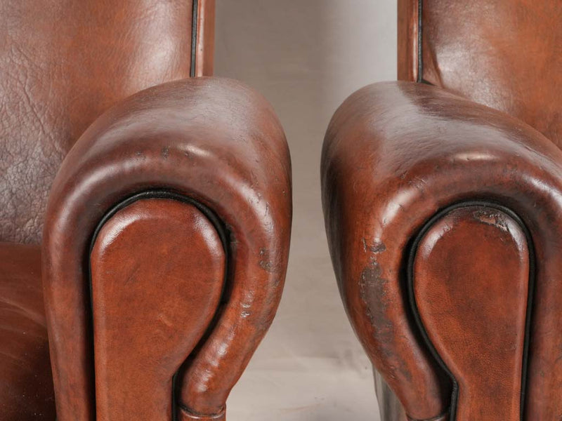 Original Havana-model aged leather chairs