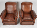 Timeless wooden-feet leather club chairs
