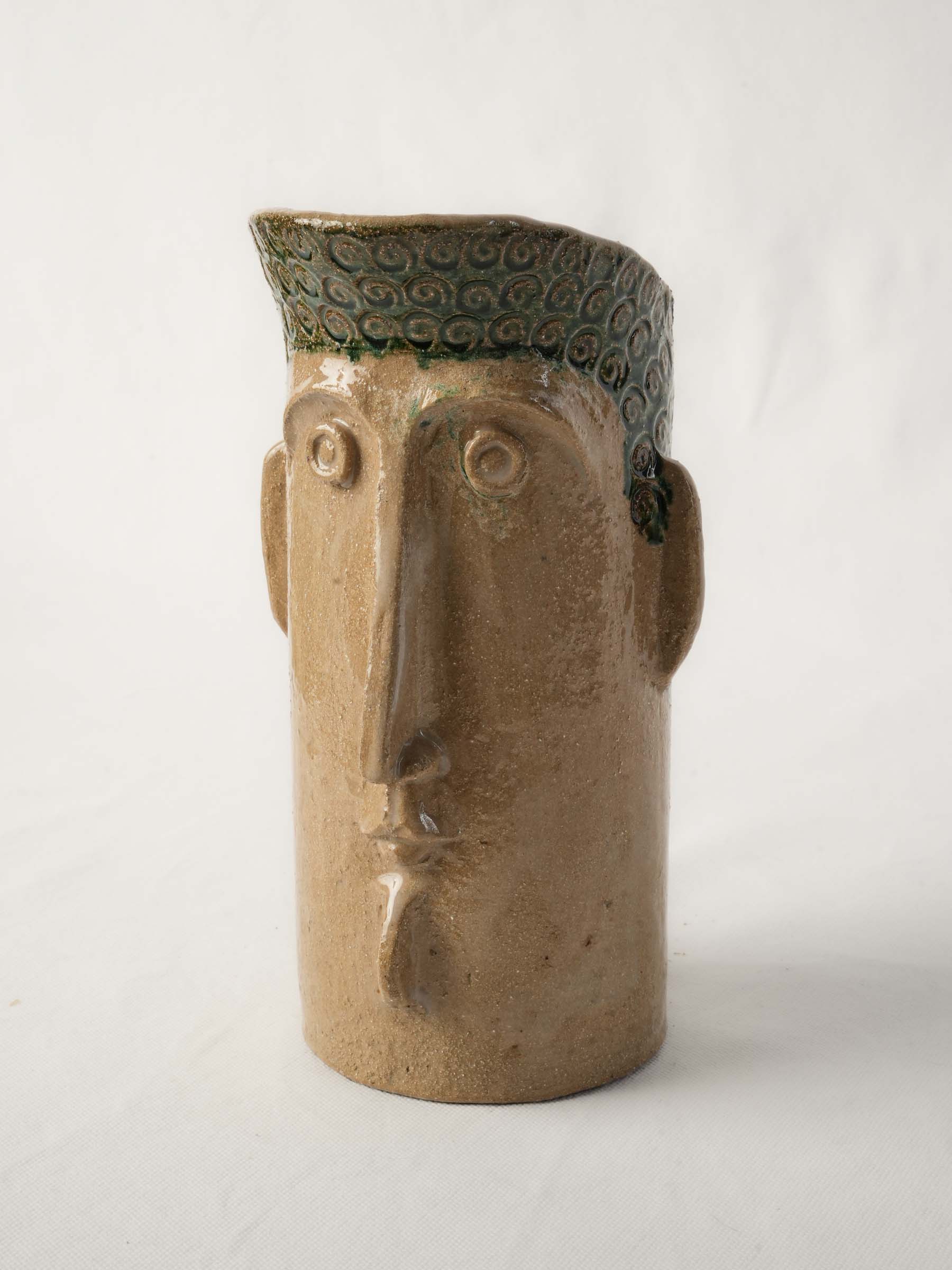 Whimsical figural stoneware pitcher  