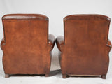 Stately antique leather Havana chairs
