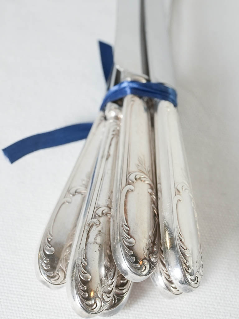 Ornate Louis XV spoons and forks