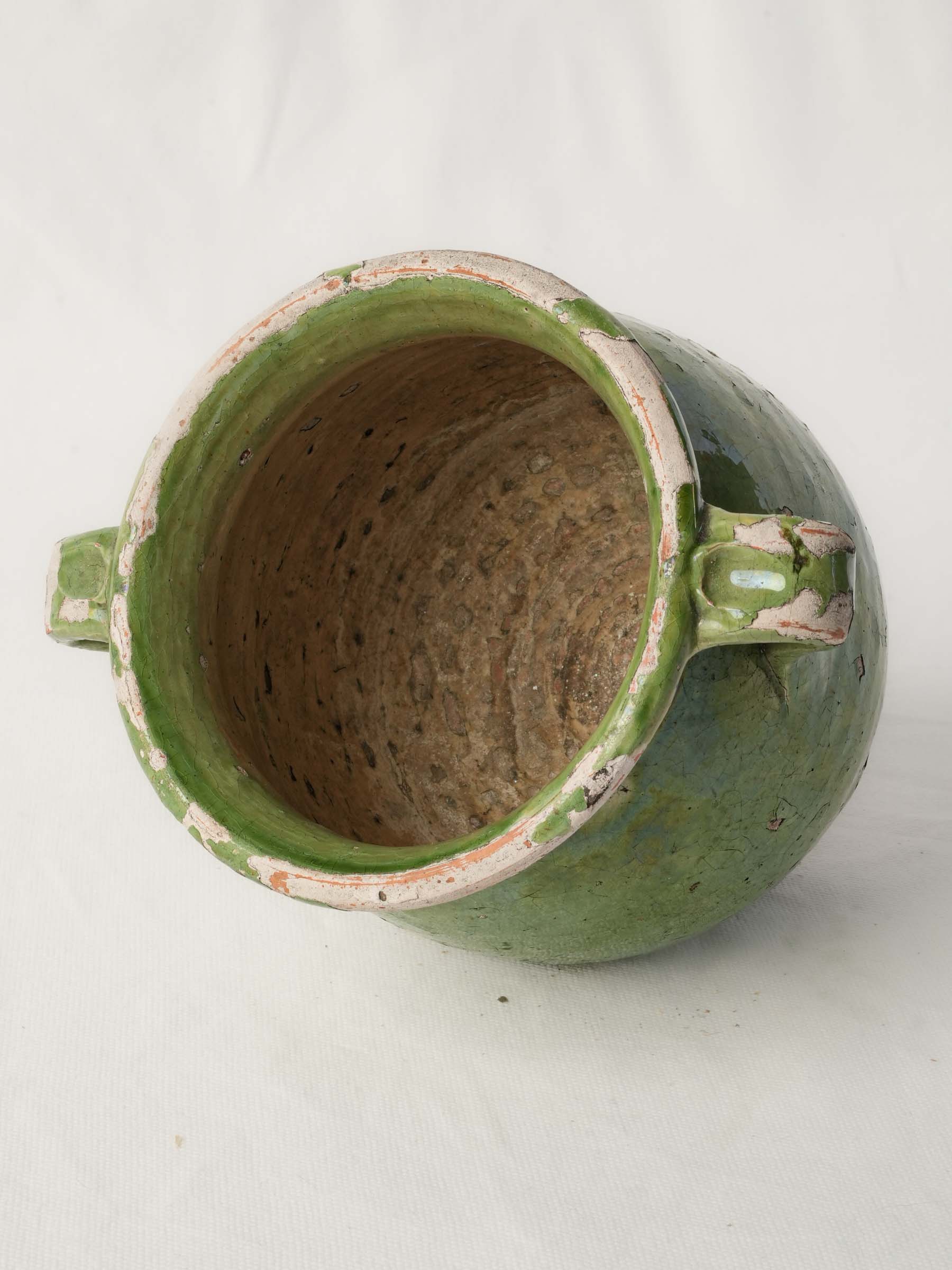 Authentic chipped rim confit pot  