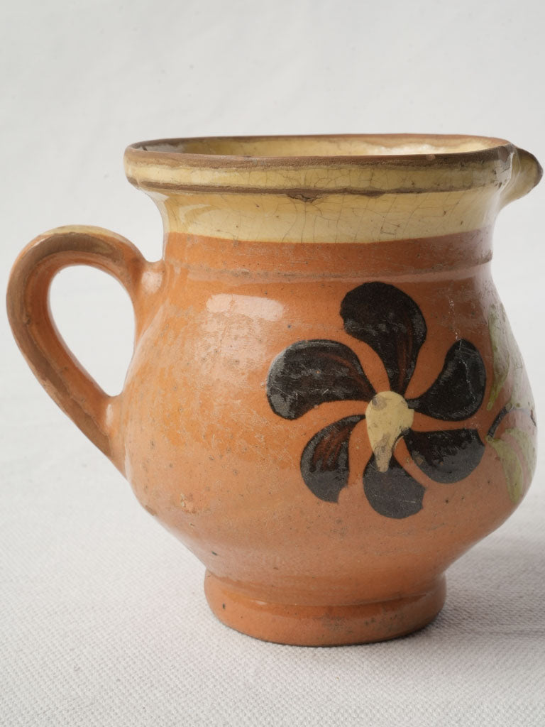 Floral-patterned Savoy pottery milk jug