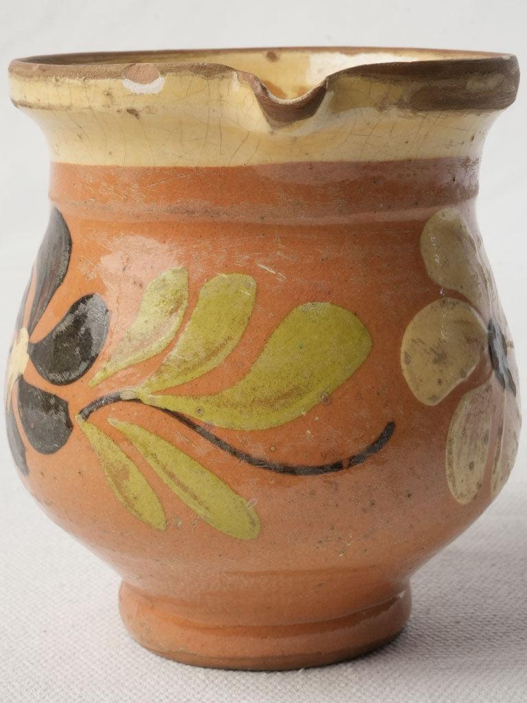 Age-worn patina milk jug