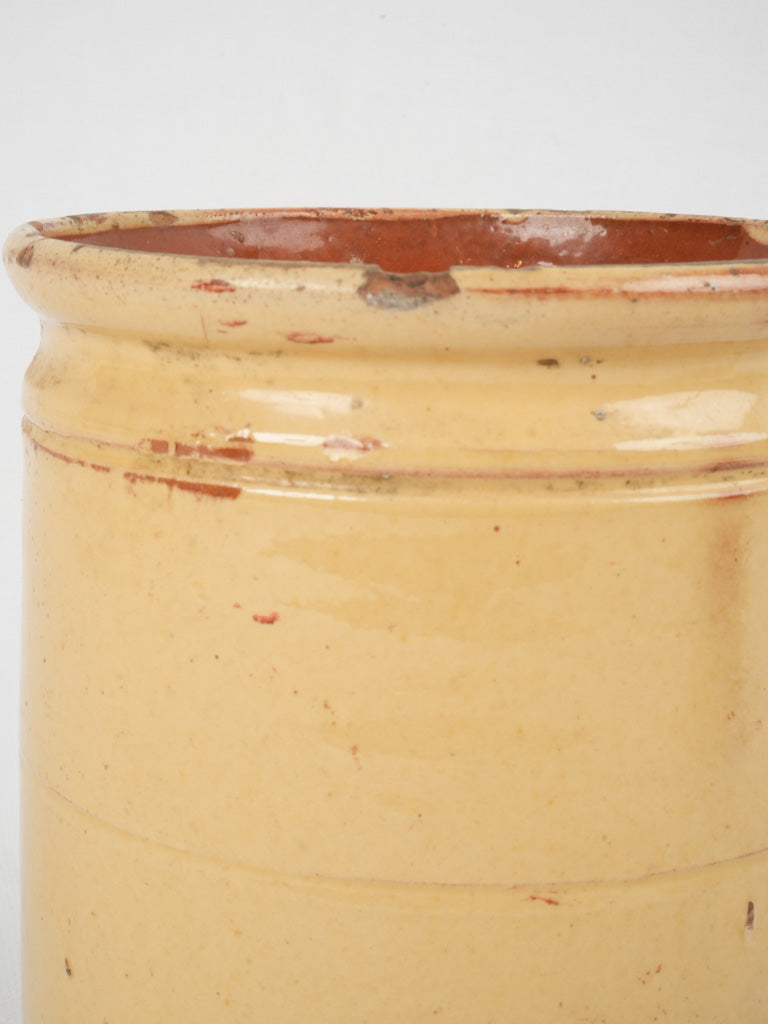 Aged yellow French ceramic vase